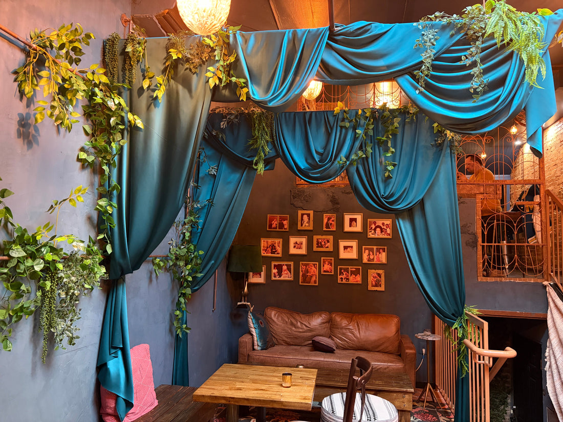 A Luxe Floral Moment: Draping, Greenery, and a VIP Nook Transformed