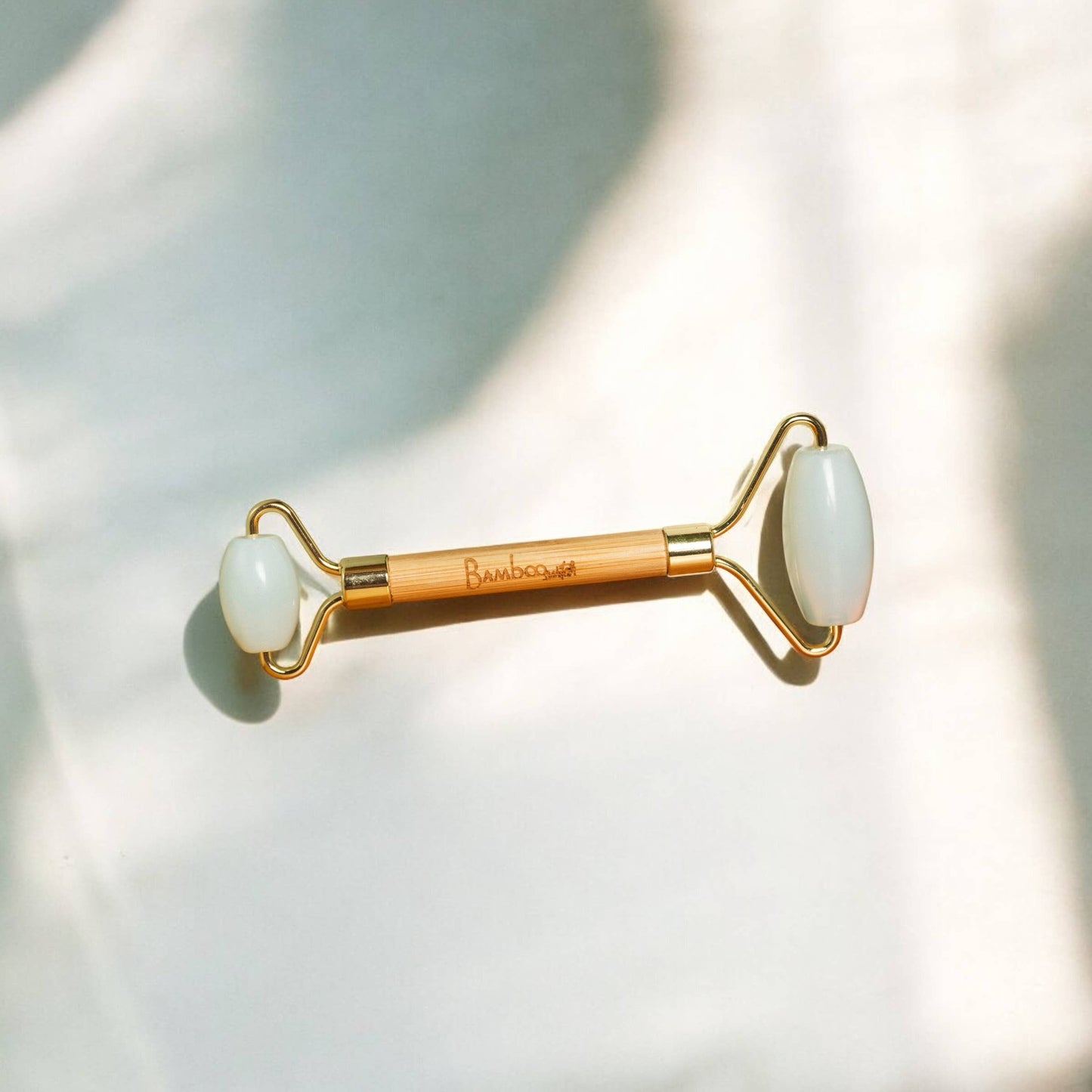 Bamboo Switch - Bamboo Facial Massage Roller | Self Care | Faire Market: White Jade