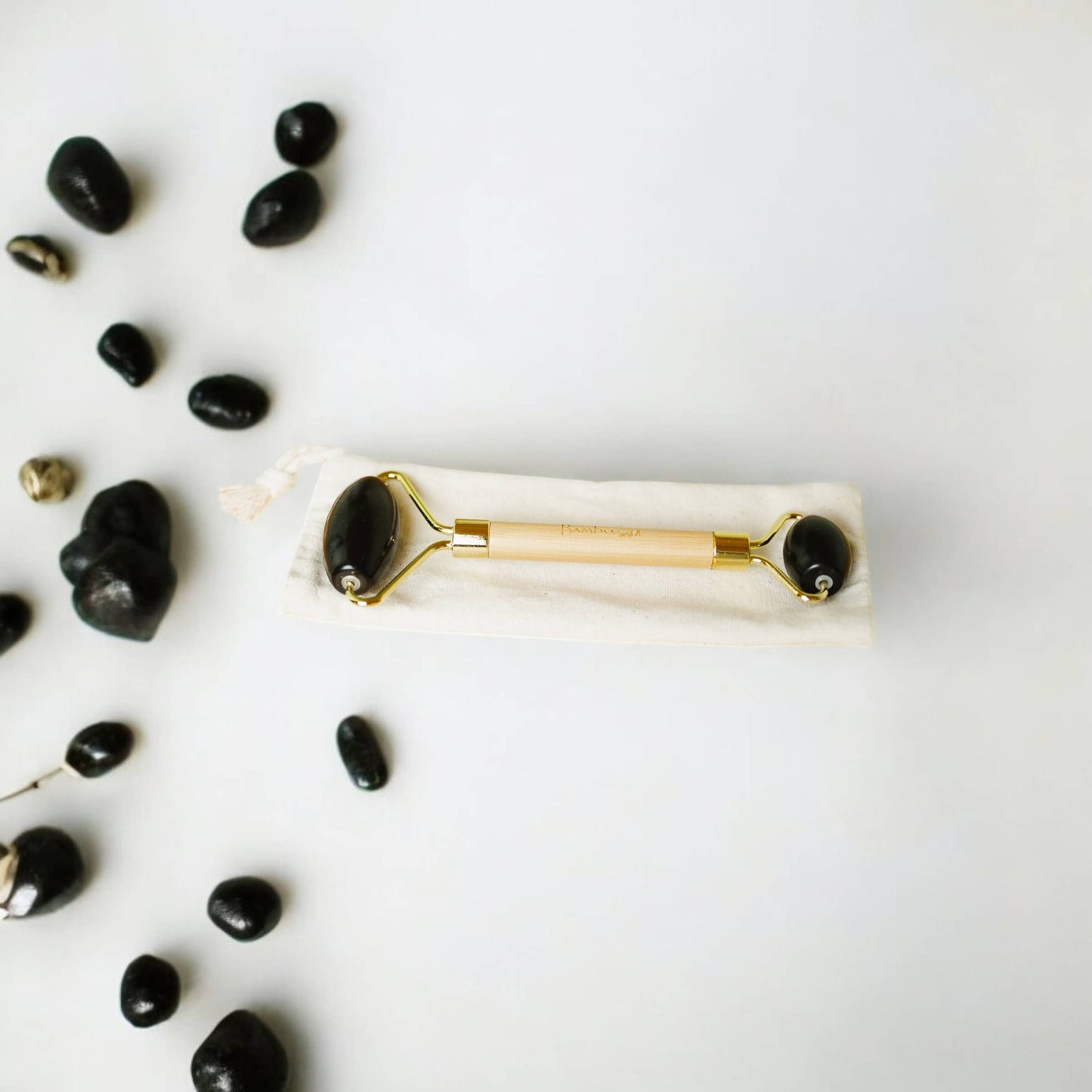 Bamboo Switch - Bamboo Facial Massage Roller | Self Care | Faire Market: White Jade